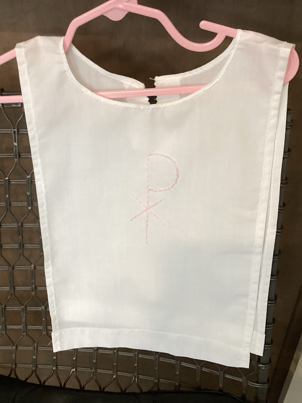 Vtg. Hand-made? Baptismal Bib (garment). The pink embroidery features the